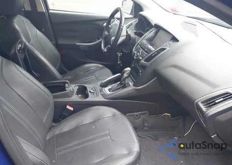 2013 Ford Focus Titanium z USA, uszkodzony, nr VIN 1FADP3J26DL116585